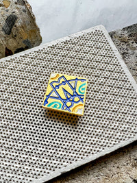 Broche Apolo circular